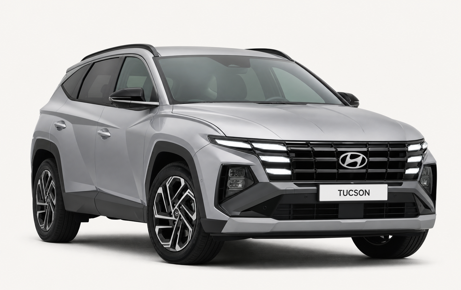 Hyundai Tucson 2026 gris sur fond clair