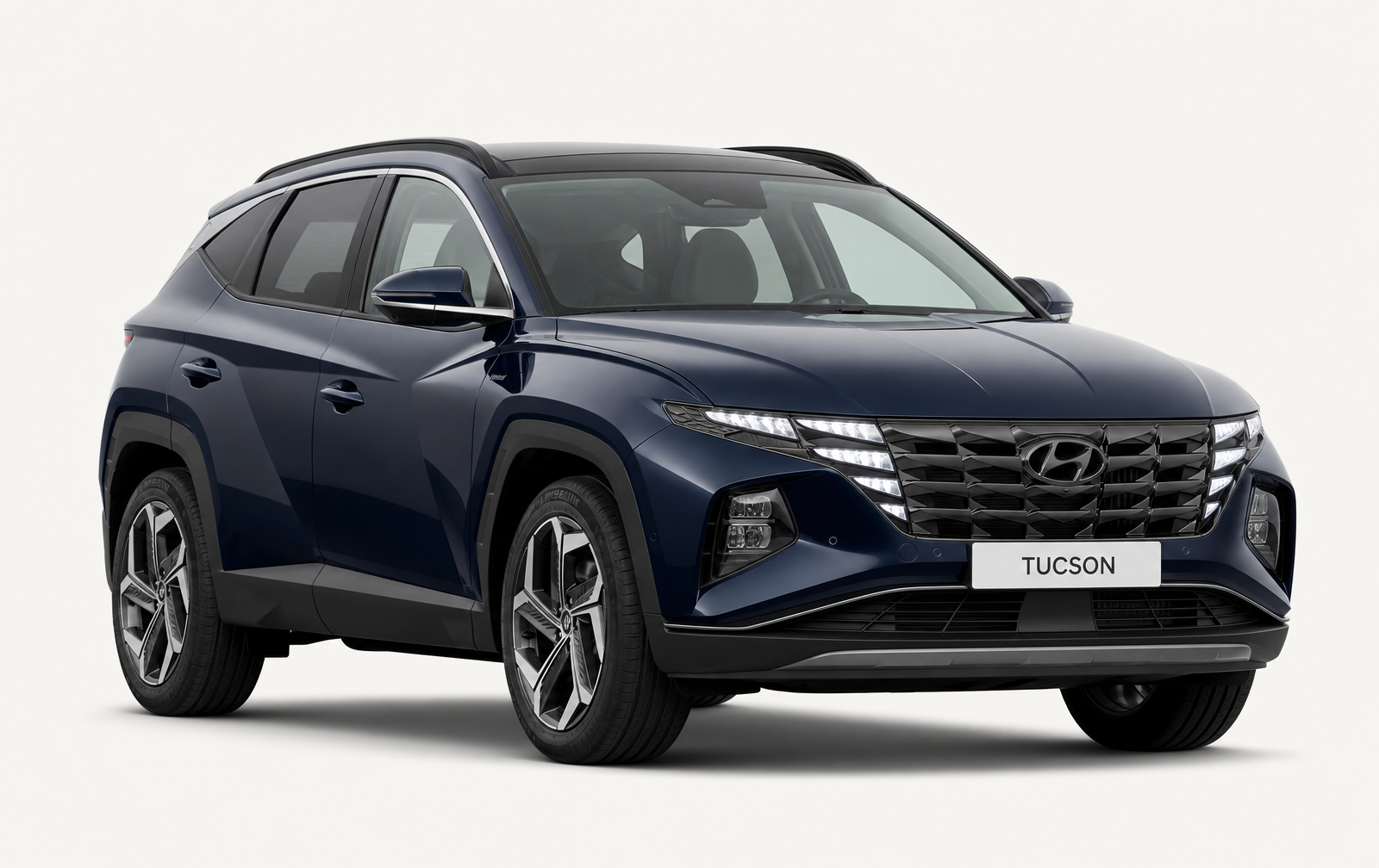 Hyundai Tucson 2025 vert foncé sur fond clair